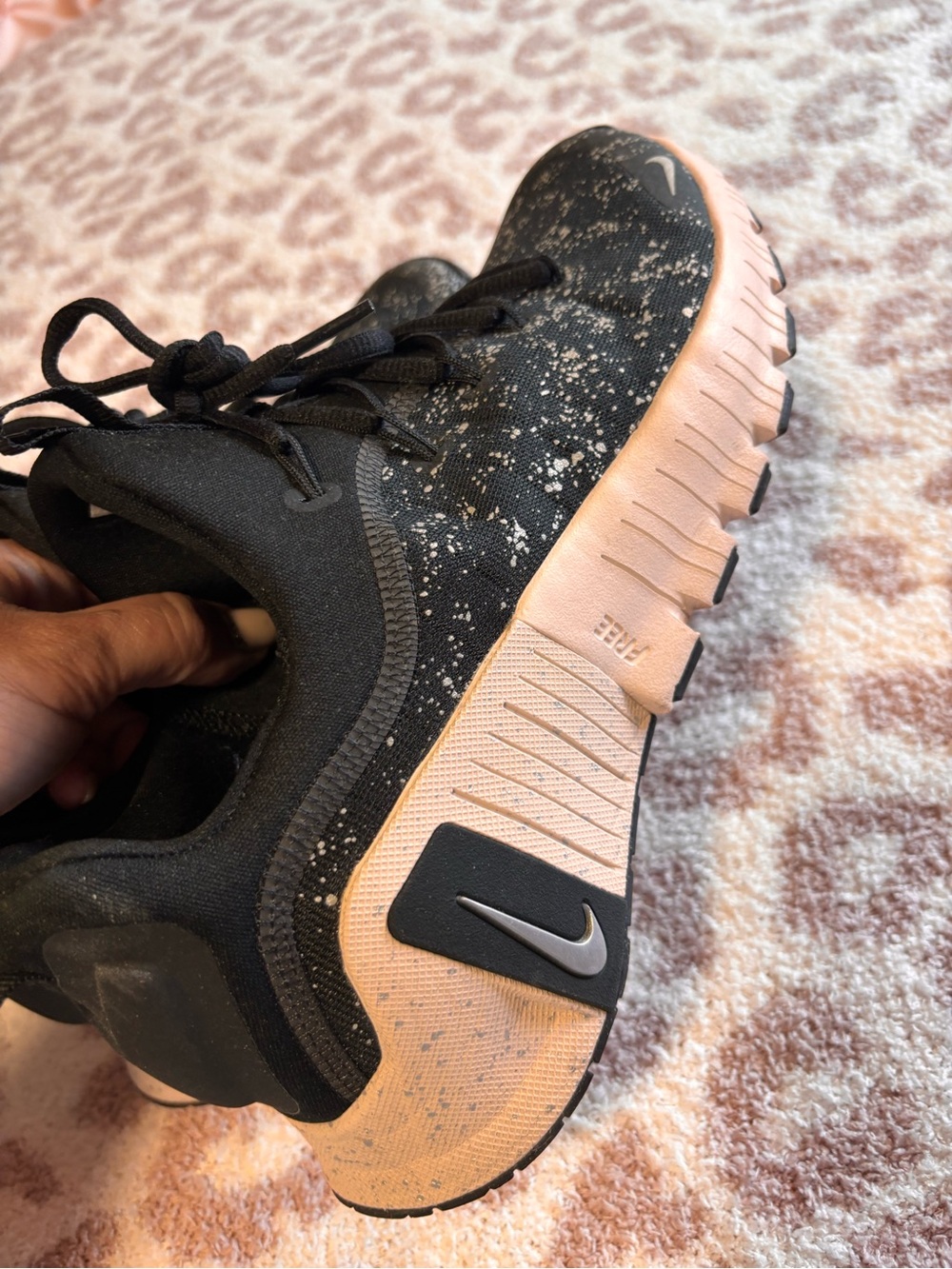 Nike women’s Black Sneakers with Pink Sole and White Speckle